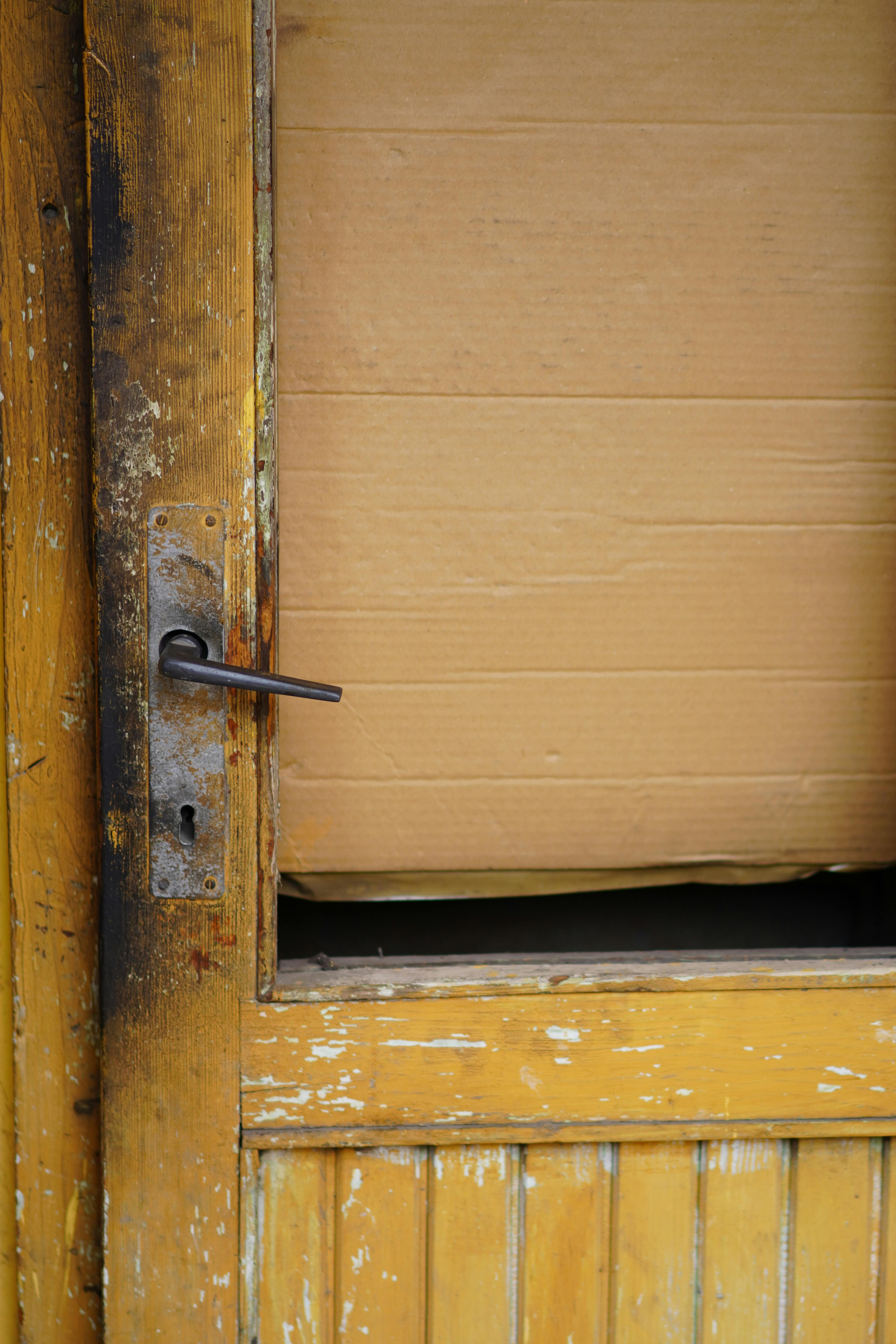 Before: Old weathered door lock